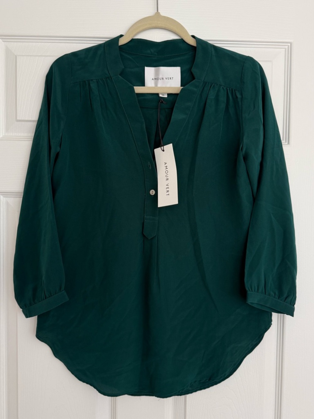 NWT: 100% sustainable silk emerald blouse